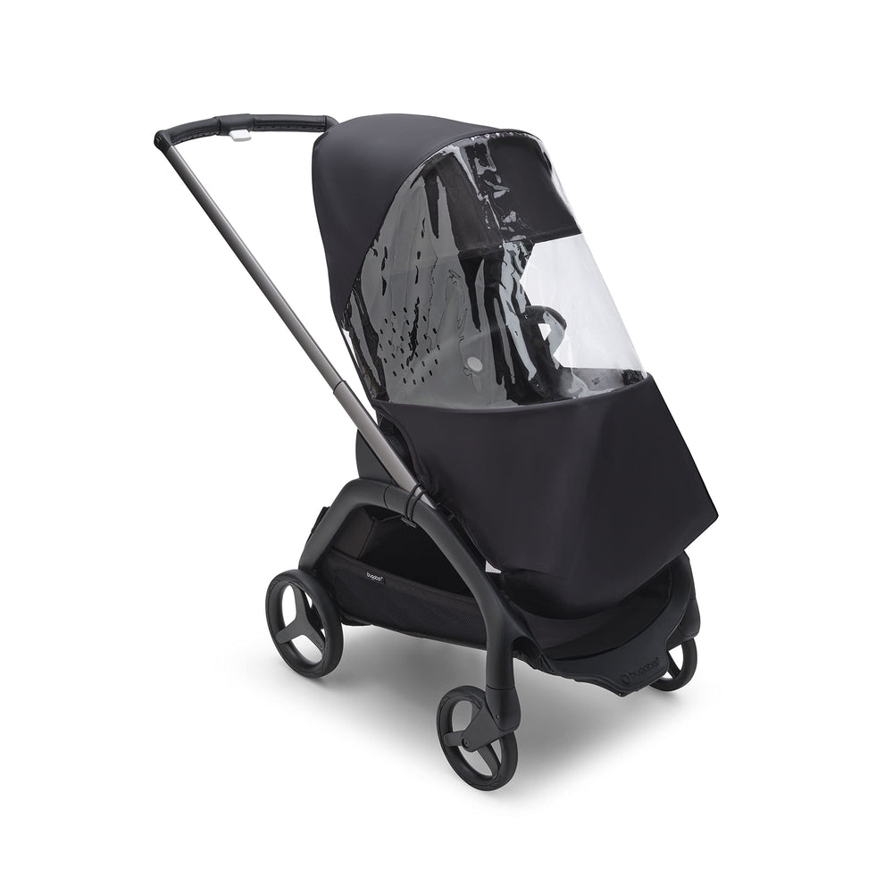 Bugaboo Dragonfly rain cover on stroller provides wind protection with clear visibility.