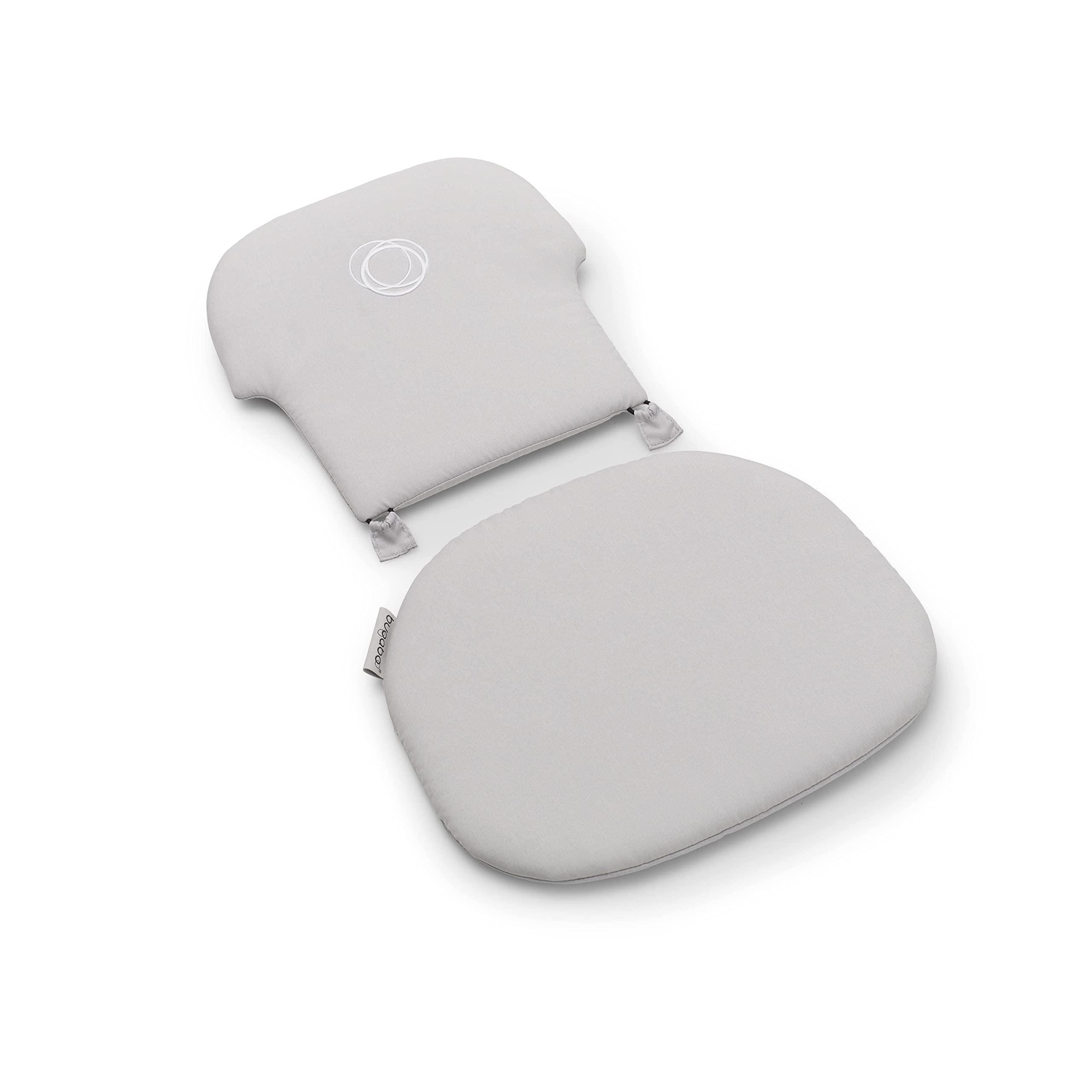 Bugaboo Giraffe backrest cushion Arctic White adds cozy support during meals.