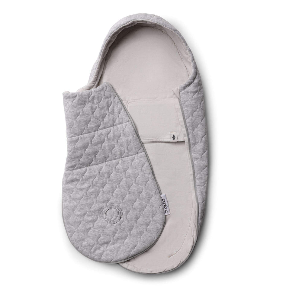 Bugaboo newborn inlay footmuff opened to show cozy lining and fit.