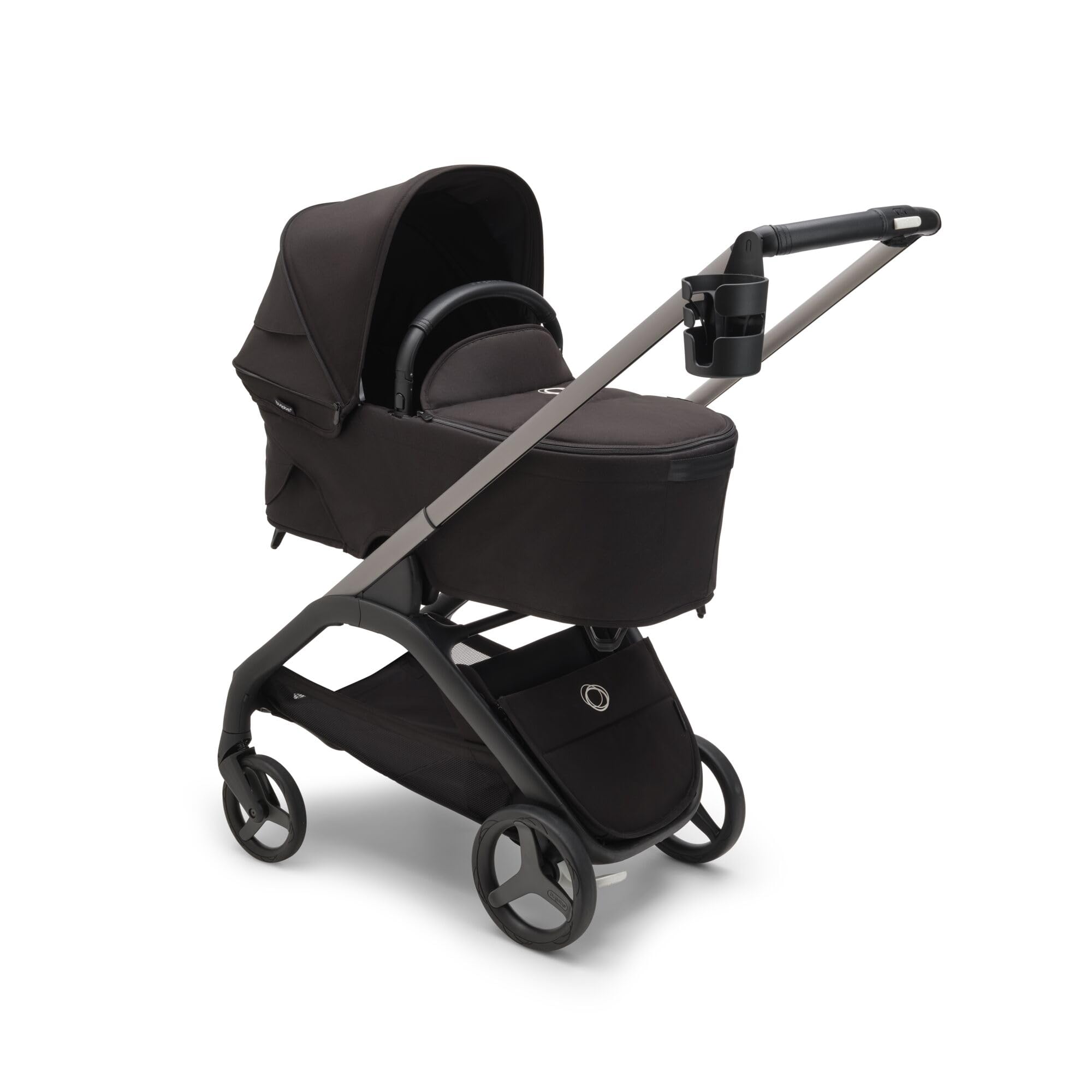 Bugaboo stroller cup holder bottle-fit accommodates bottles and travel mugs of varying sizes.