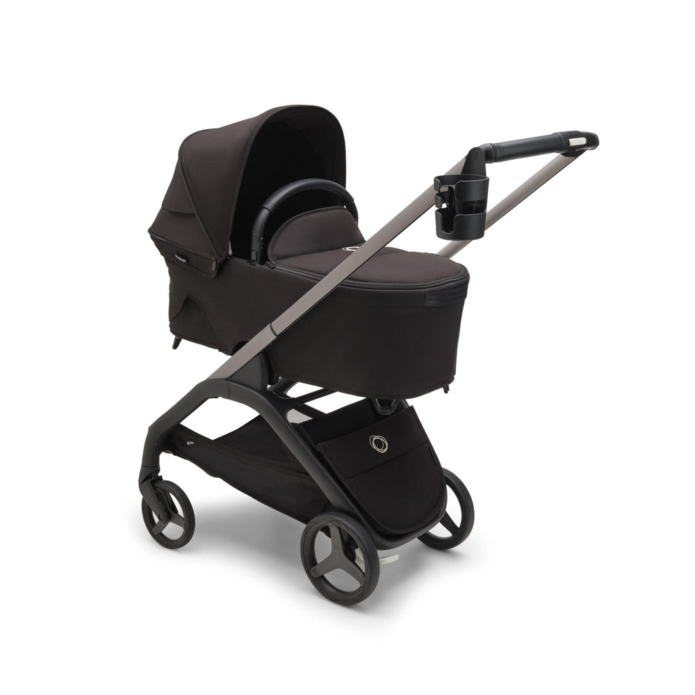 Bugaboo stroller cup holder bottle-fit accommodates bottles and travel mugs of varying sizes.
