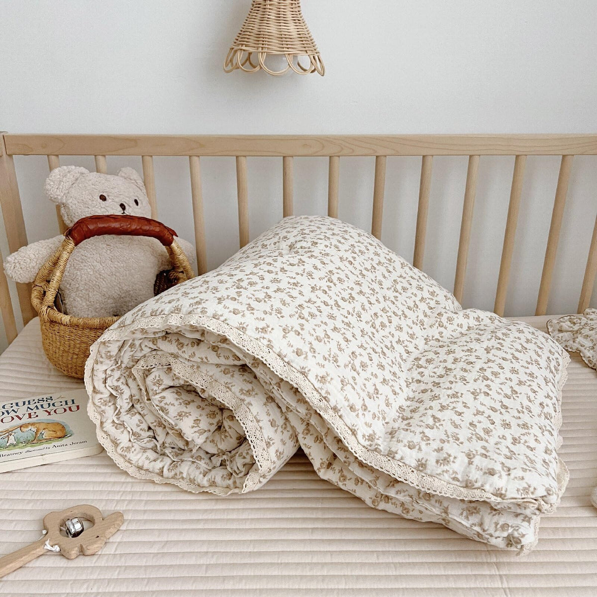 BuLuTu Carmine Flower Blanket fabric close-up shows soft muslin texture ideal for sensitive skin.