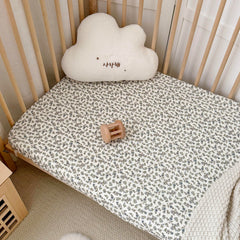 BuLuTu blue floral print fits standard cribs securely with 360-degree elastic.