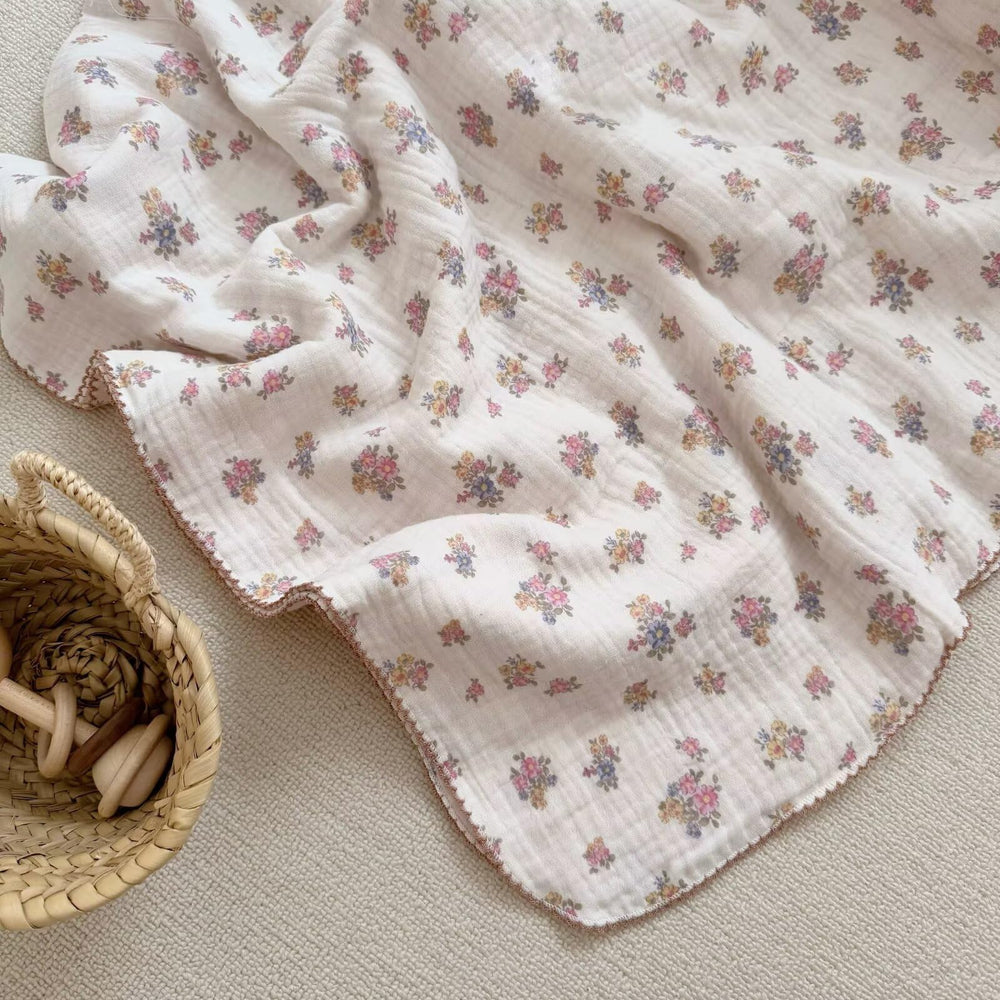 BuLuTu Muslin Cotton Baby Blanket with tuberose pattern highlights chic nursery style.