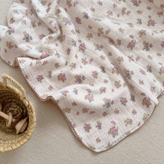 BuLuTu Muslin Cotton Baby Blanket with tuberose pattern highlights chic nursery style.