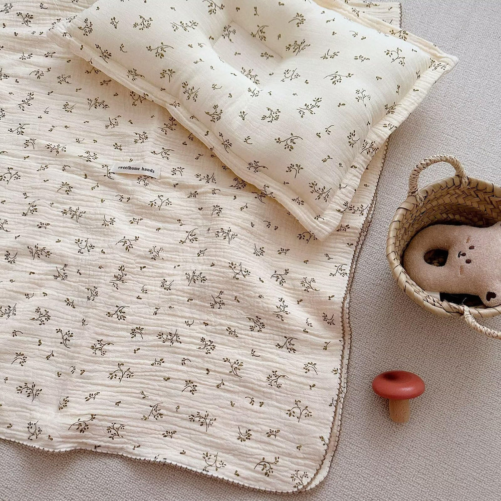 BuLuTu muslin blanket in stroller, olive pattern, breathable coverage for outings.
