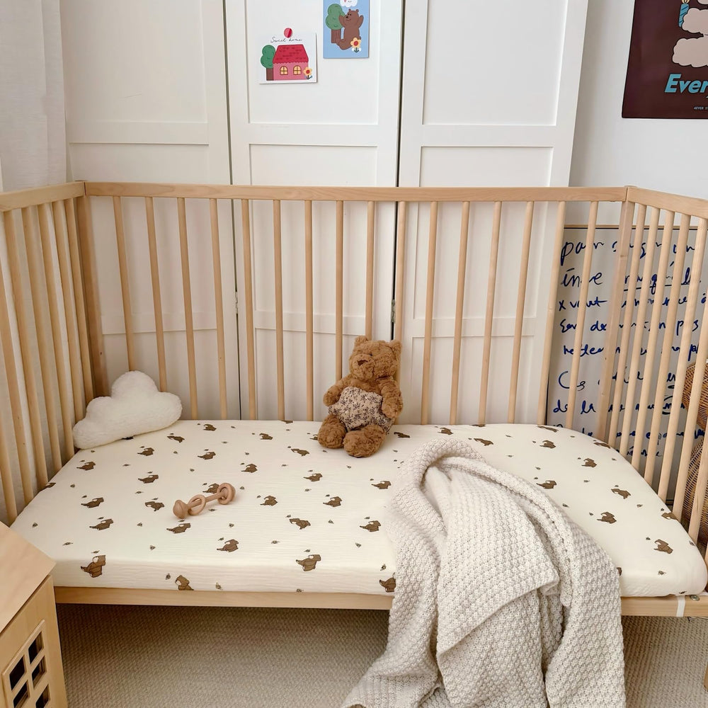 BuLuTu duck-print muslin crib sheet offers gentle touch and playful nursery style.