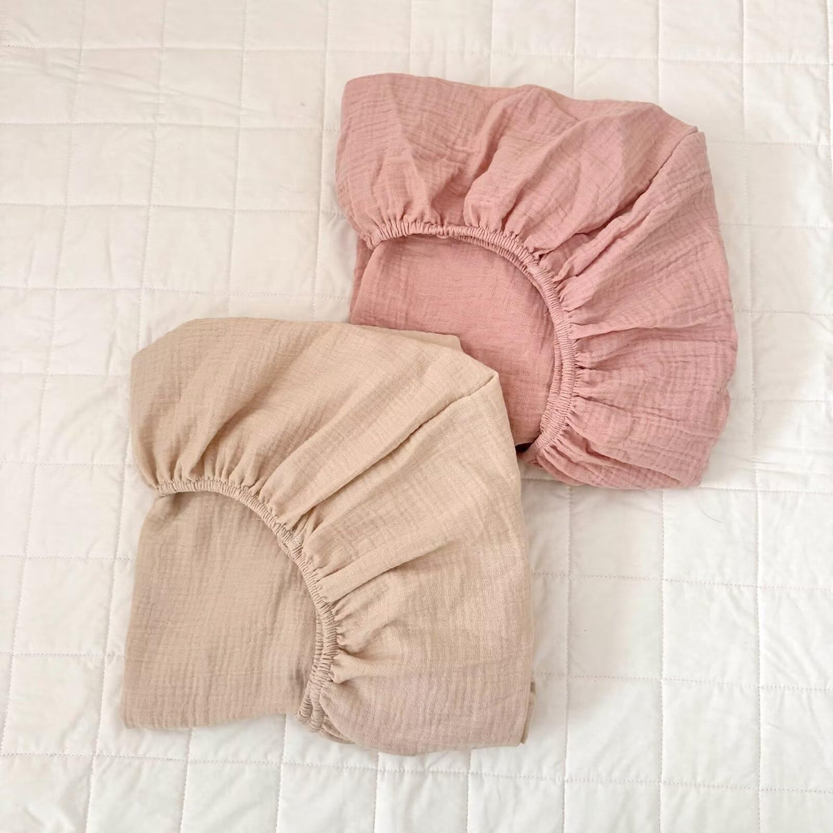 BuLuTu muslin fitted crib sheets provide a snug 52x28 fit for standard cribs, soft and breathable