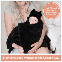 Bumba Kids sherpa fleece double-sided swaddle for all-around softness.