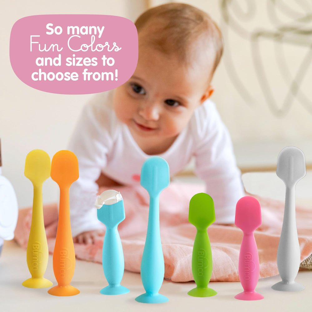 Bumco suction-base keeps the spatula upright during diaper changes.