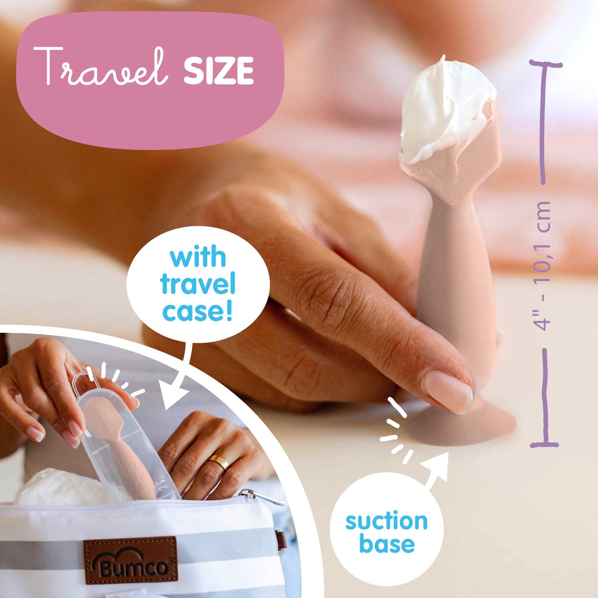 Bumco diaper spatula with suction base staying upright during changes.
