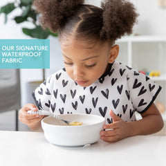 Bumkins bib back closure provides quick, adjustable, tug-proof fit for wriggly toddlers.