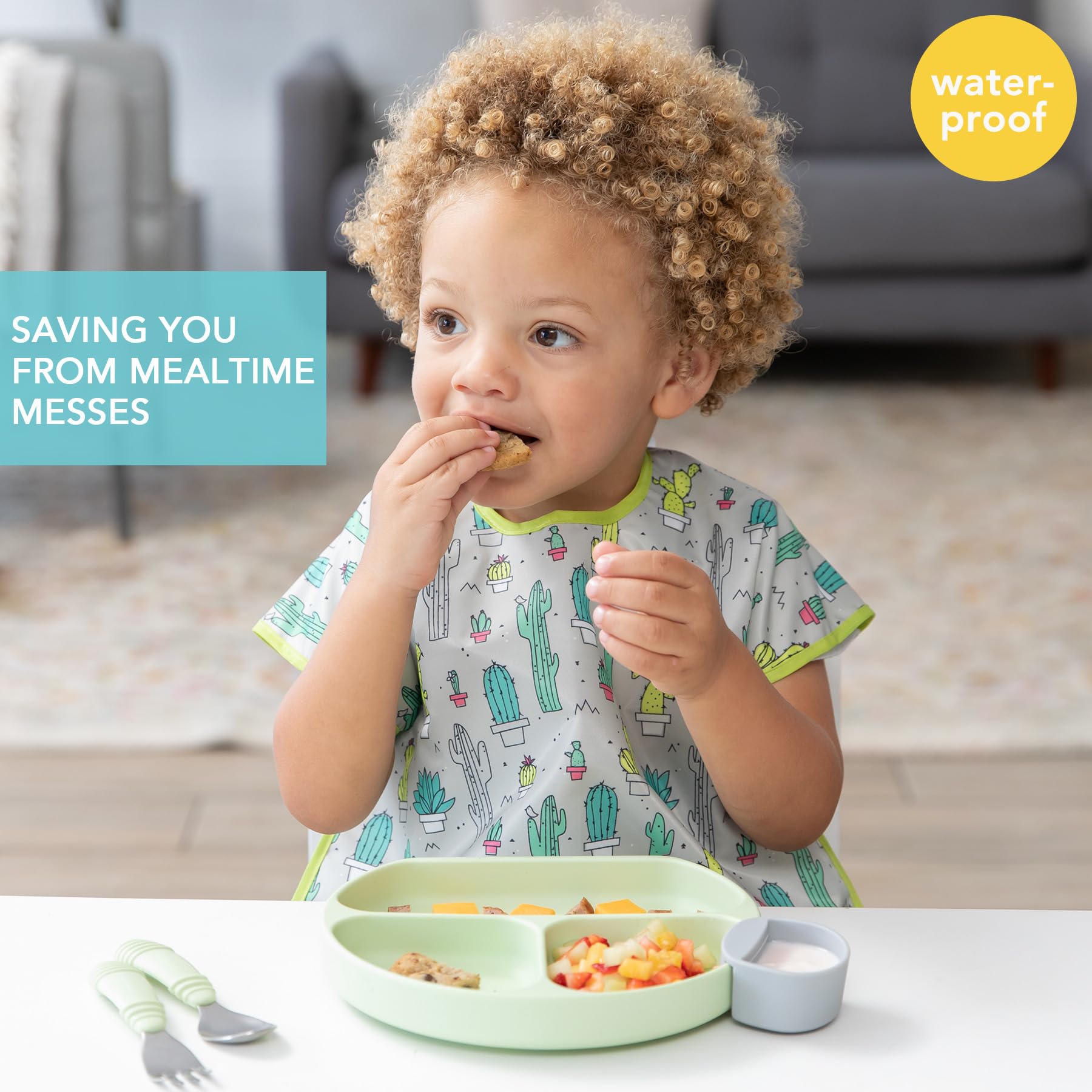 Bumkins bib features back closure for quick, adjustable fit.