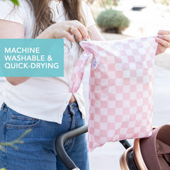 Bumkins Larger Wet Bag colorfast fabric close-up showing vibrant designs after washing.