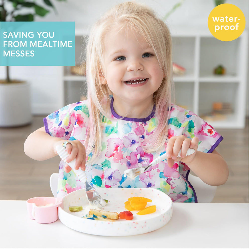 Bumkins short sleeve bib with crumb-catcher pocket catches spills and crumbs.