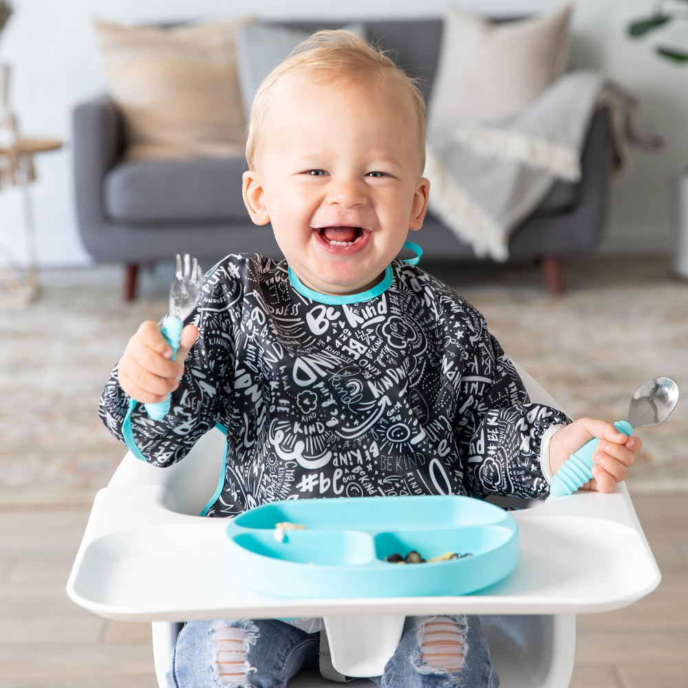 Bumkins Sleeved Bib crumb-catcher pocket helps contain spills during feeding.