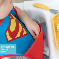 Bumkins SuperBib catch pocket visible for catching crumbs and spills.