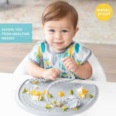Bumkins SuperBib crumb-catcher pocket collects spills for easier cleanup.