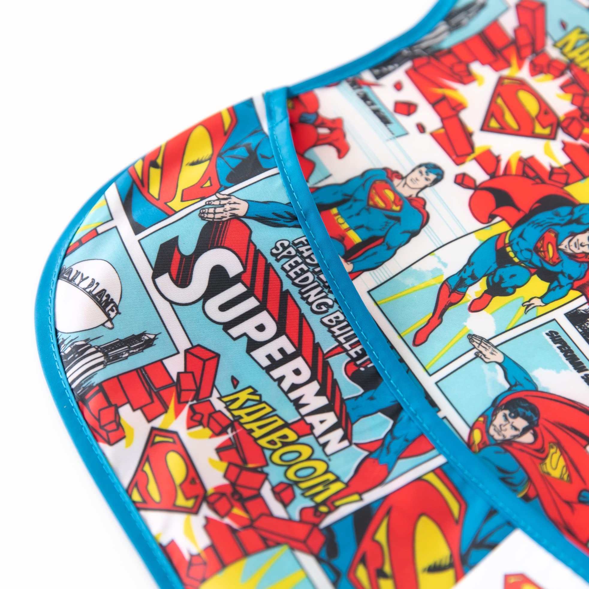 Bumkins SuperBib machine-washable fabric tag signals quick cleanup.