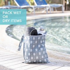 Bumkins arrows-hearts wet bag open with damp swimwear for beach day swap