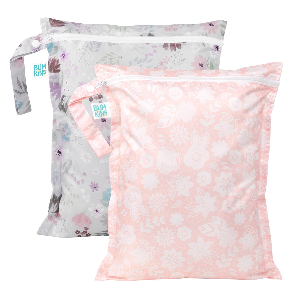 Bumkins Waterproof Wet Bag Floral Lace closed for compact, leak-containing on-the-go storage.