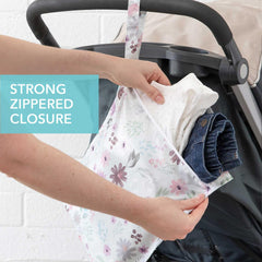 Bumkins Waterproof Wet Bag Floral Lace keeps diaper essentials neatly organized in a bag.