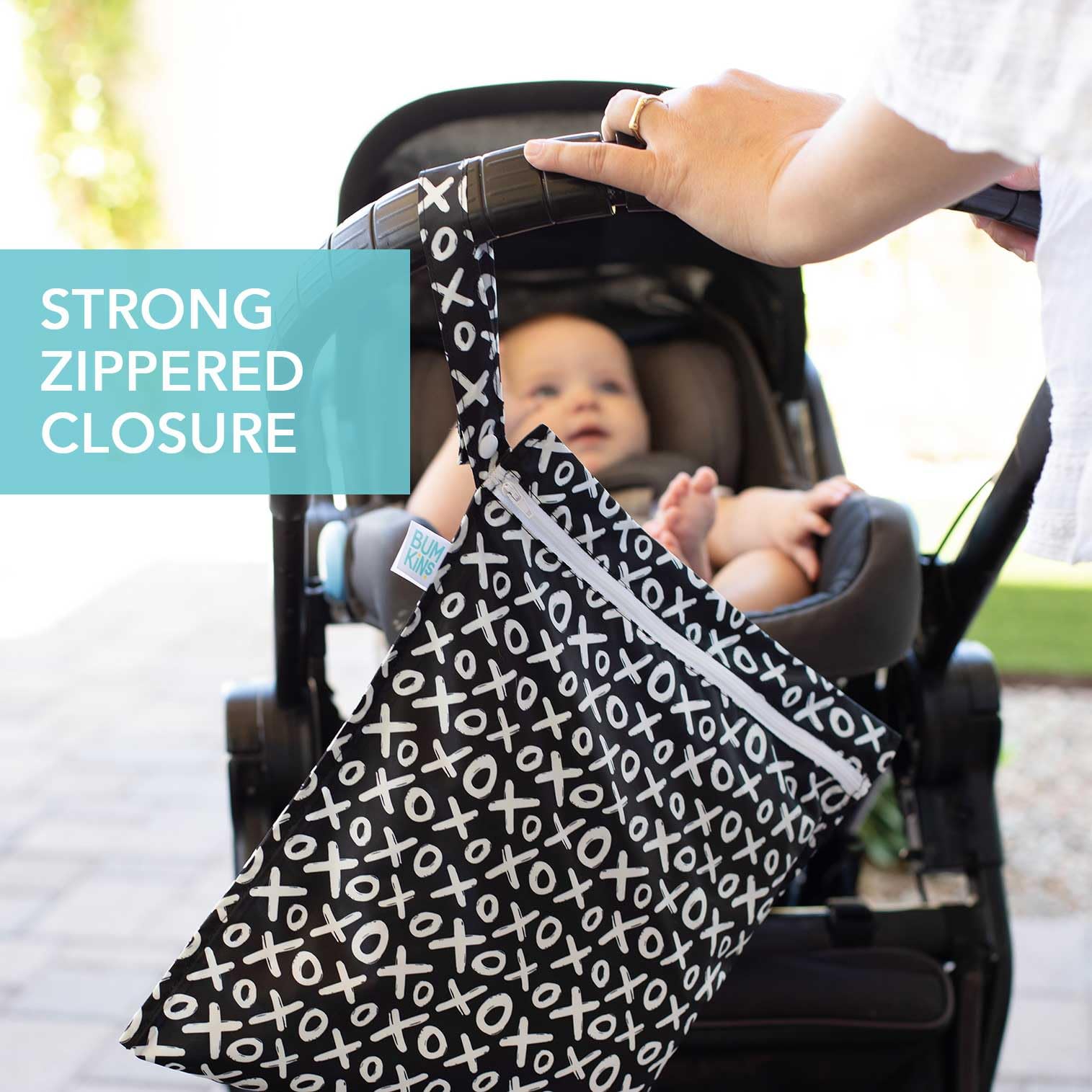 Bumkins wet bag waterproof fabric—keeps contents dry with heat-sealed seams in busy days.