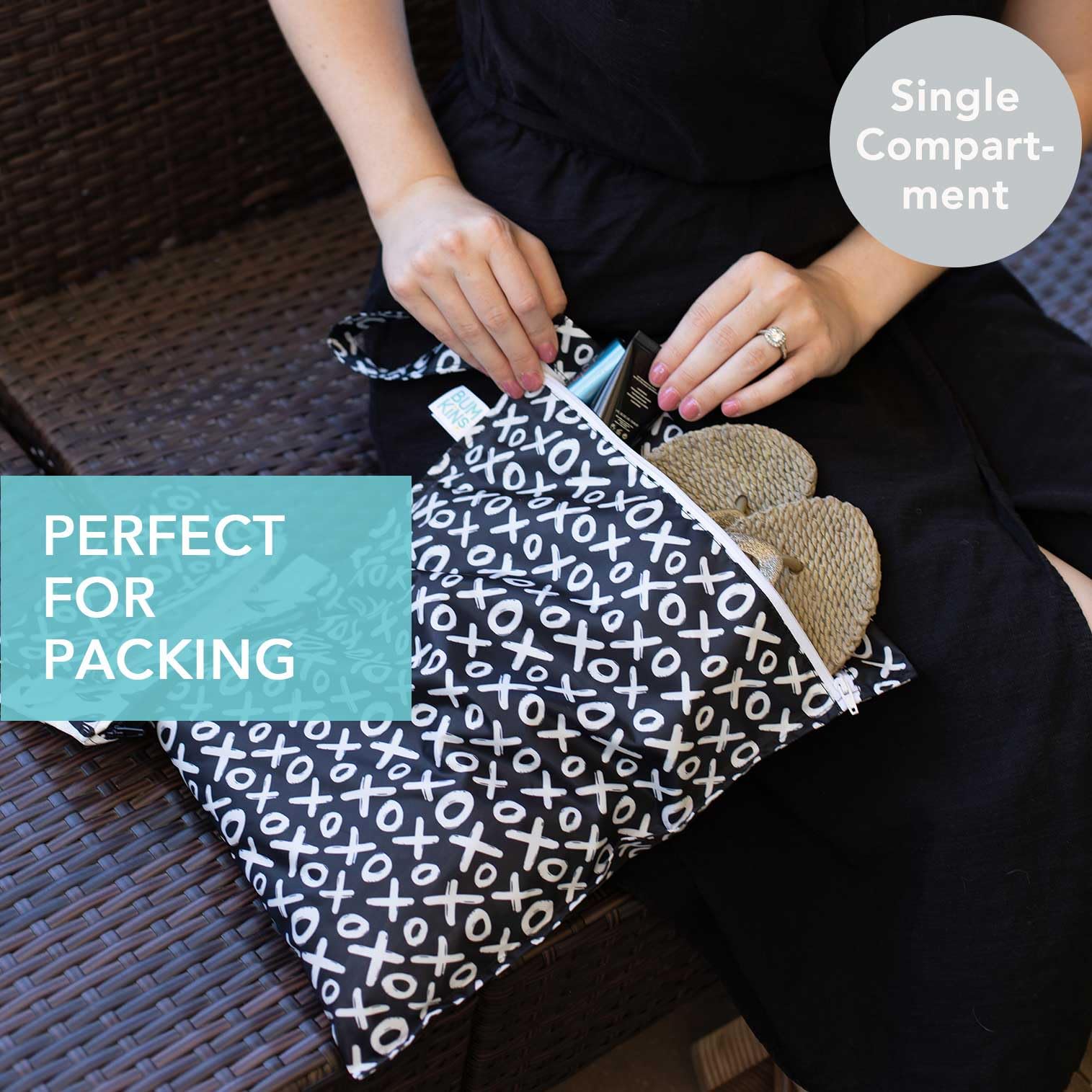 Bumkins wet bag xoxo pattern—compact organizer for diaper bag essentials during travel.