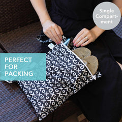 Bumkins wet bag xoxo pattern—compact organizer for diaper bag essentials during travel.