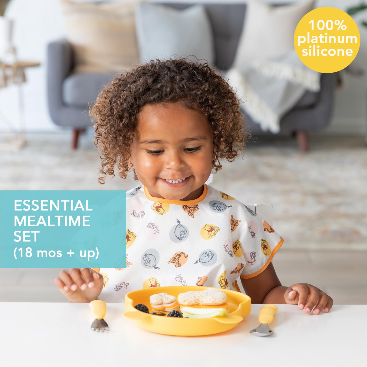 Bumkins Winnie the Pooh suction base on tray demonstrates secure attachment for easy self-feeding