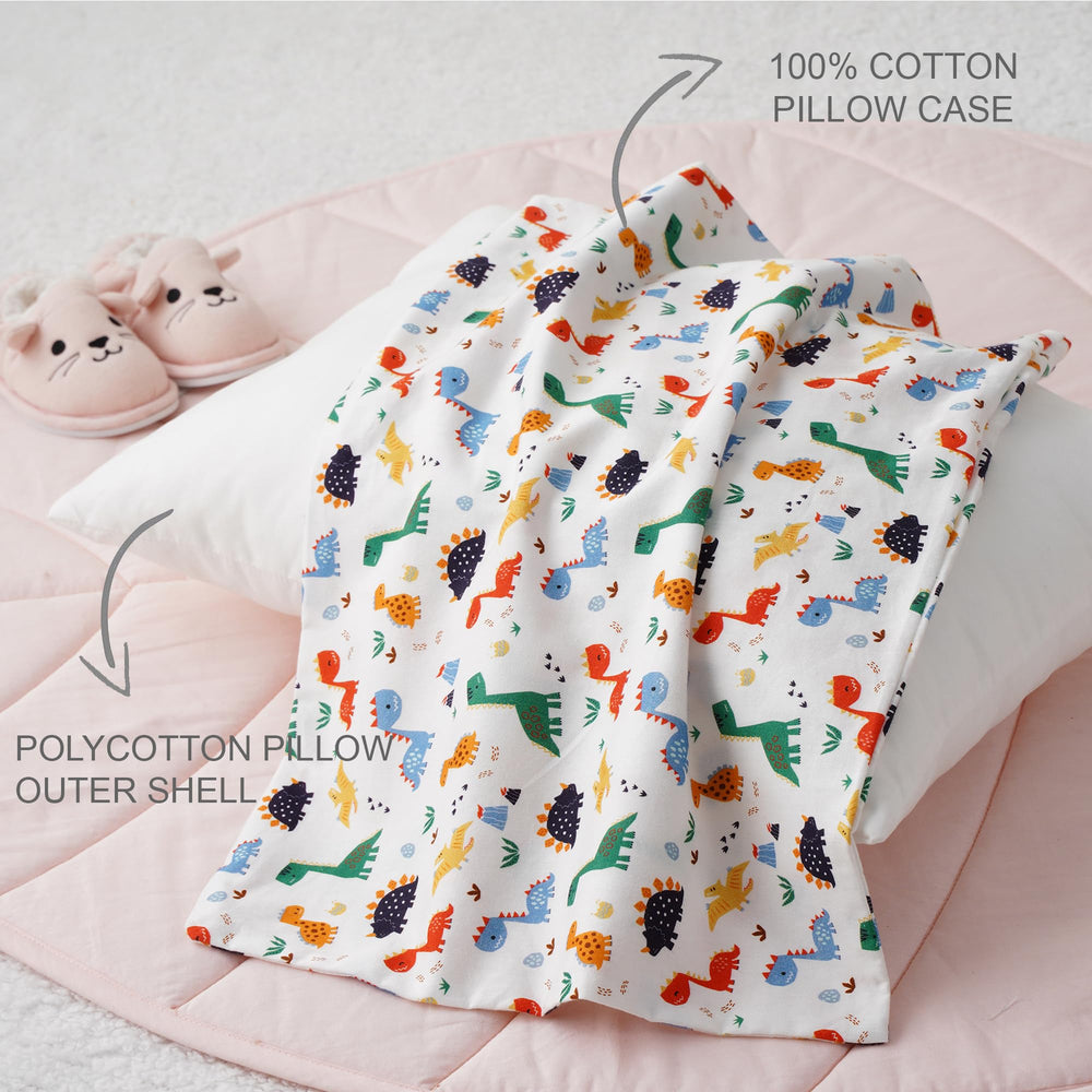 Bunnikins & Clover travel-ready pillow sits with a small backpack on a travel bed.