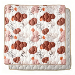 Bunnikins & Clover baby play mat folded compact for storage and portability.