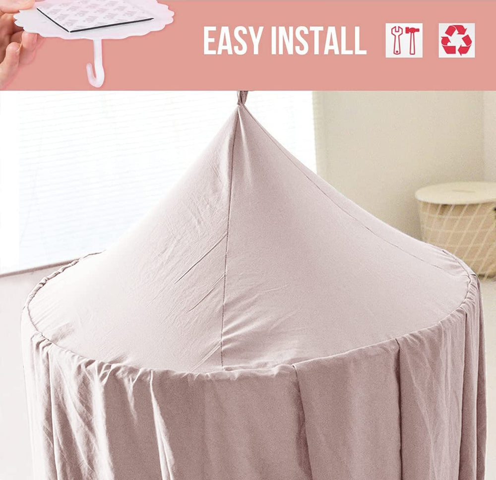 Bunnikins & Clover canopy creates a bright reading nook under the canopy.