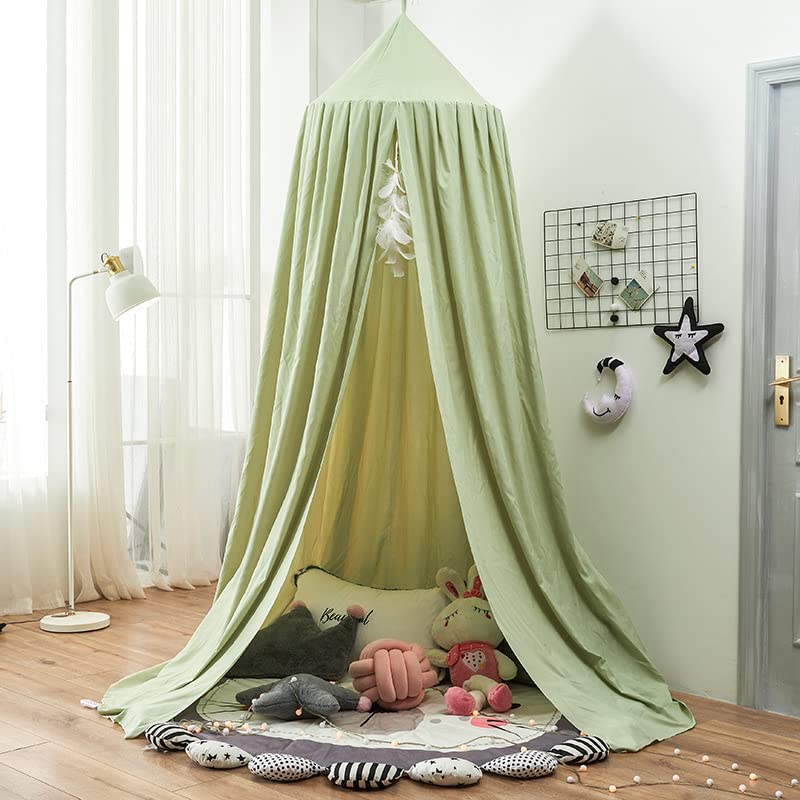 Bunnikins & Clover pea-green canopy as nursery decor in a bright room