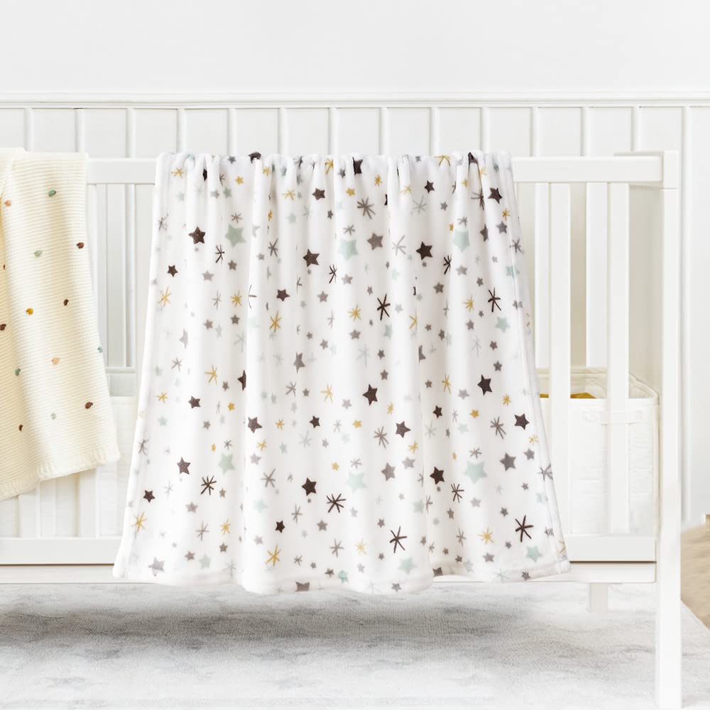 Bunnikins and Clover blanket folded compact portability for on-the-go use.