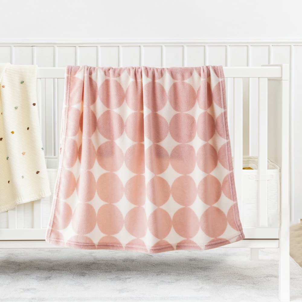 Bunnikins & Clover folded travel blanket — compact and easy to carry.