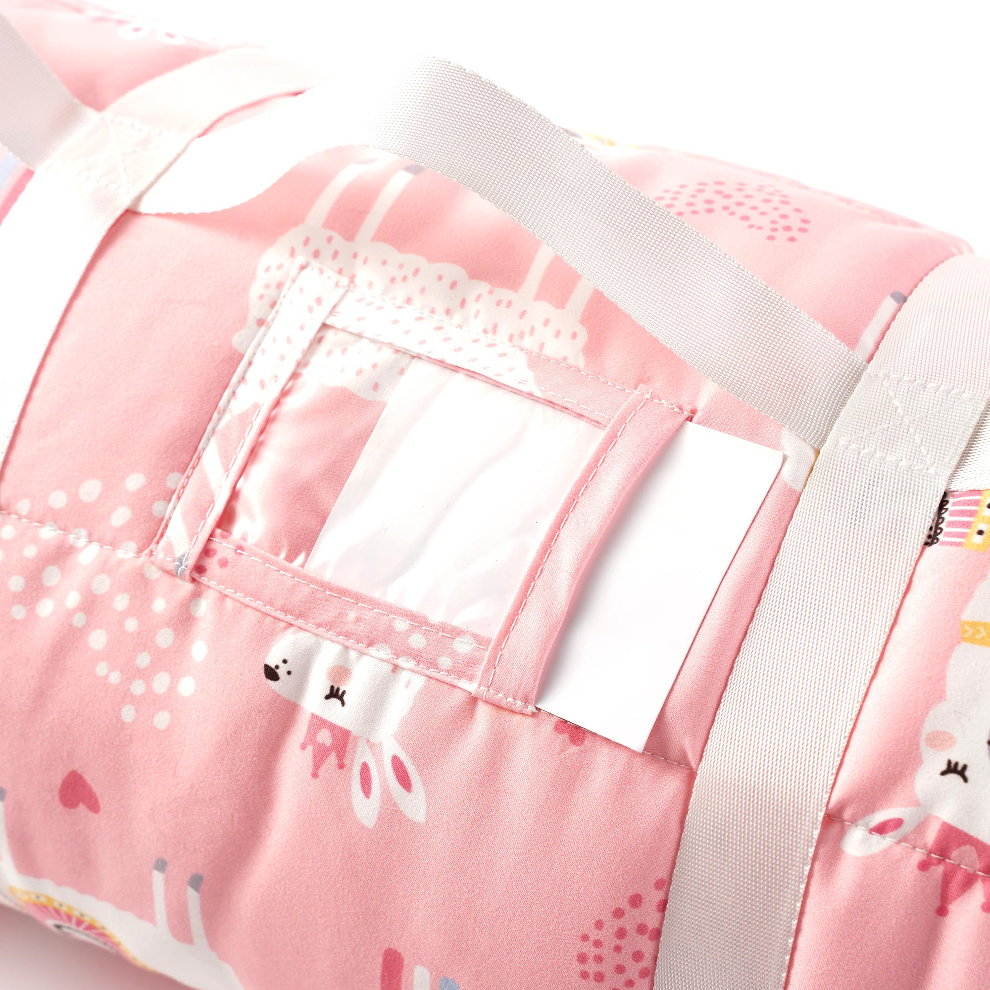 Top handle on Bunnikins & Clover nap mat for simple carrying