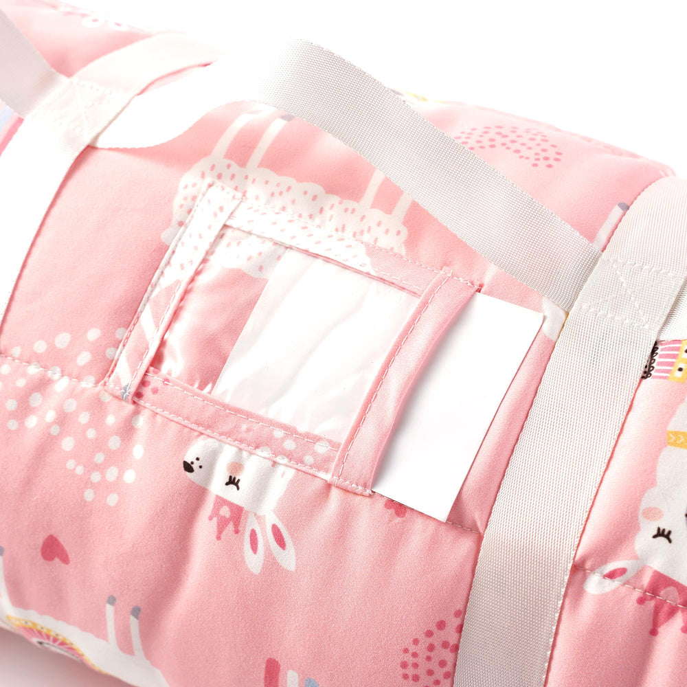 Top handle on Bunnikins & Clover nap mat for simple carrying