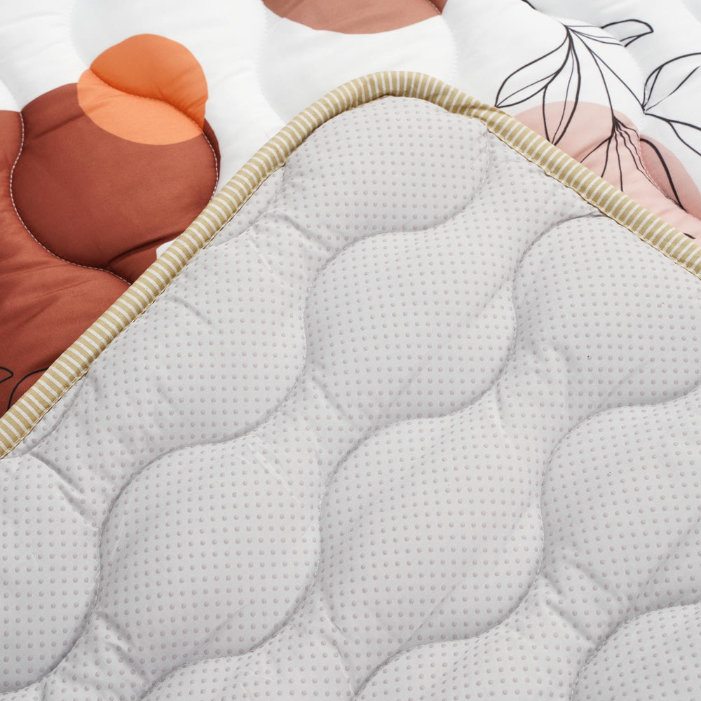 Bunnikins & Clover spacious floor mat invites siblings to join in playtime.
