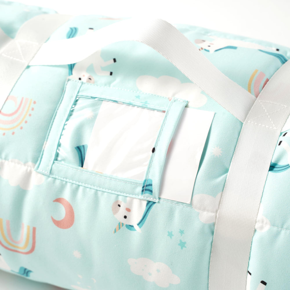 Bunnikins & Clover ultralight roll-up mat for easy travel.