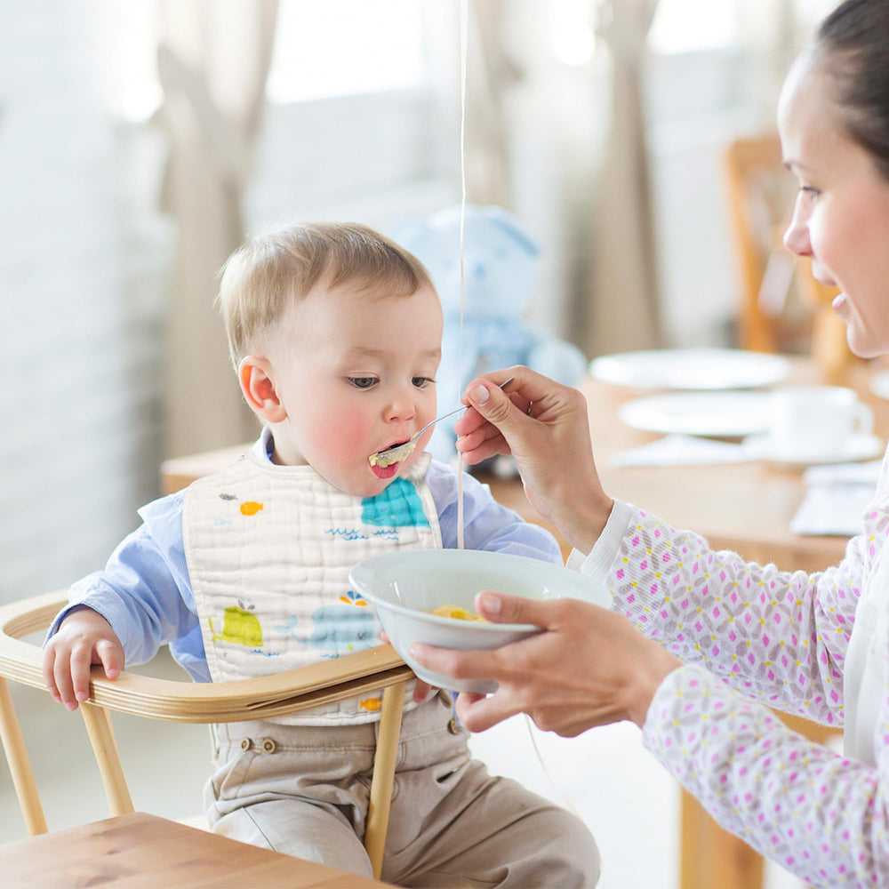 BUoonyer bibs ease laundry and mess management during feeding, playing, and teething moments.