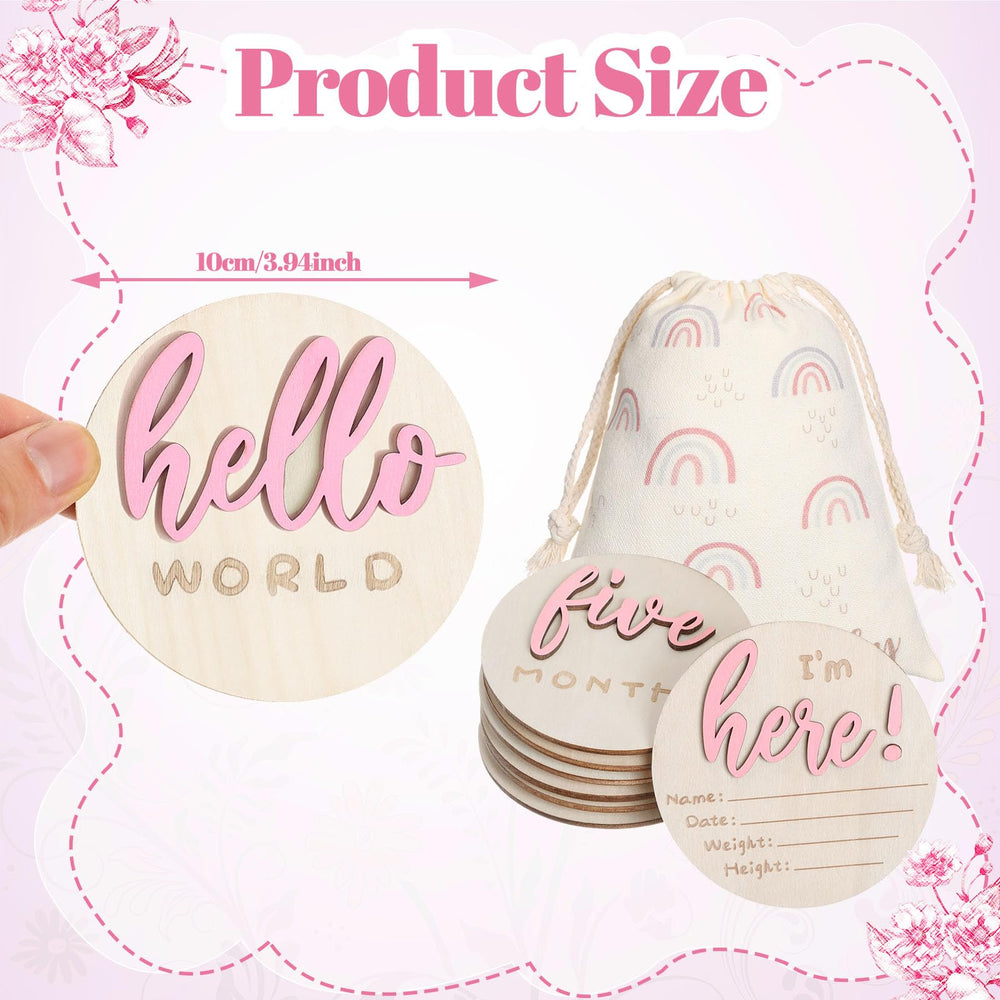 Burbell 3D carved milestone discs add depth and character to each monthly photo.
