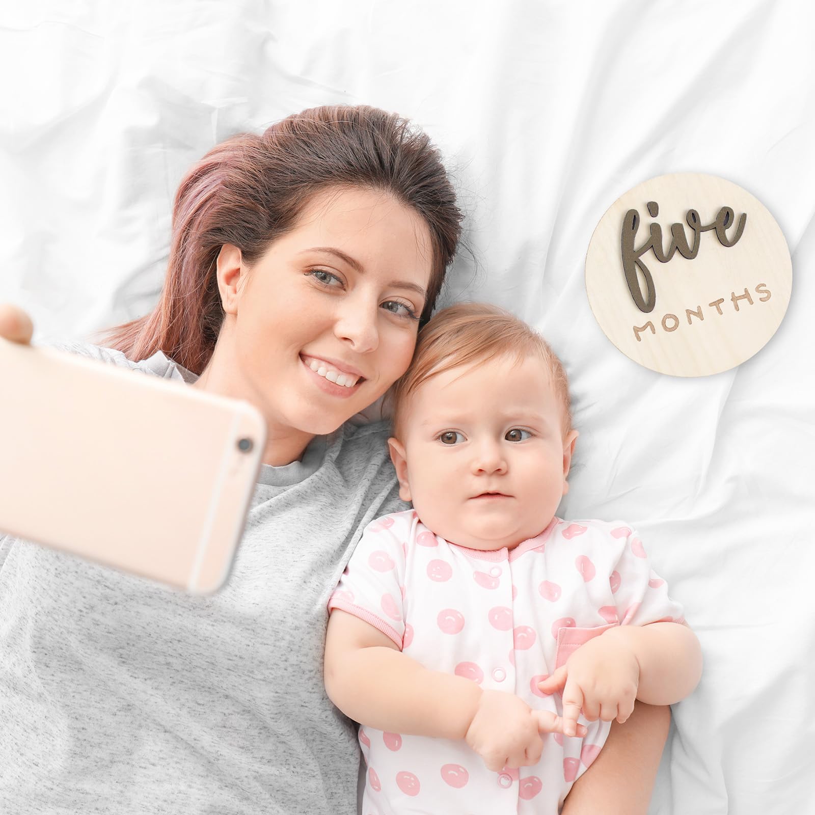 Burbell baby shower photo prop setup offers elegant memory keepsakes