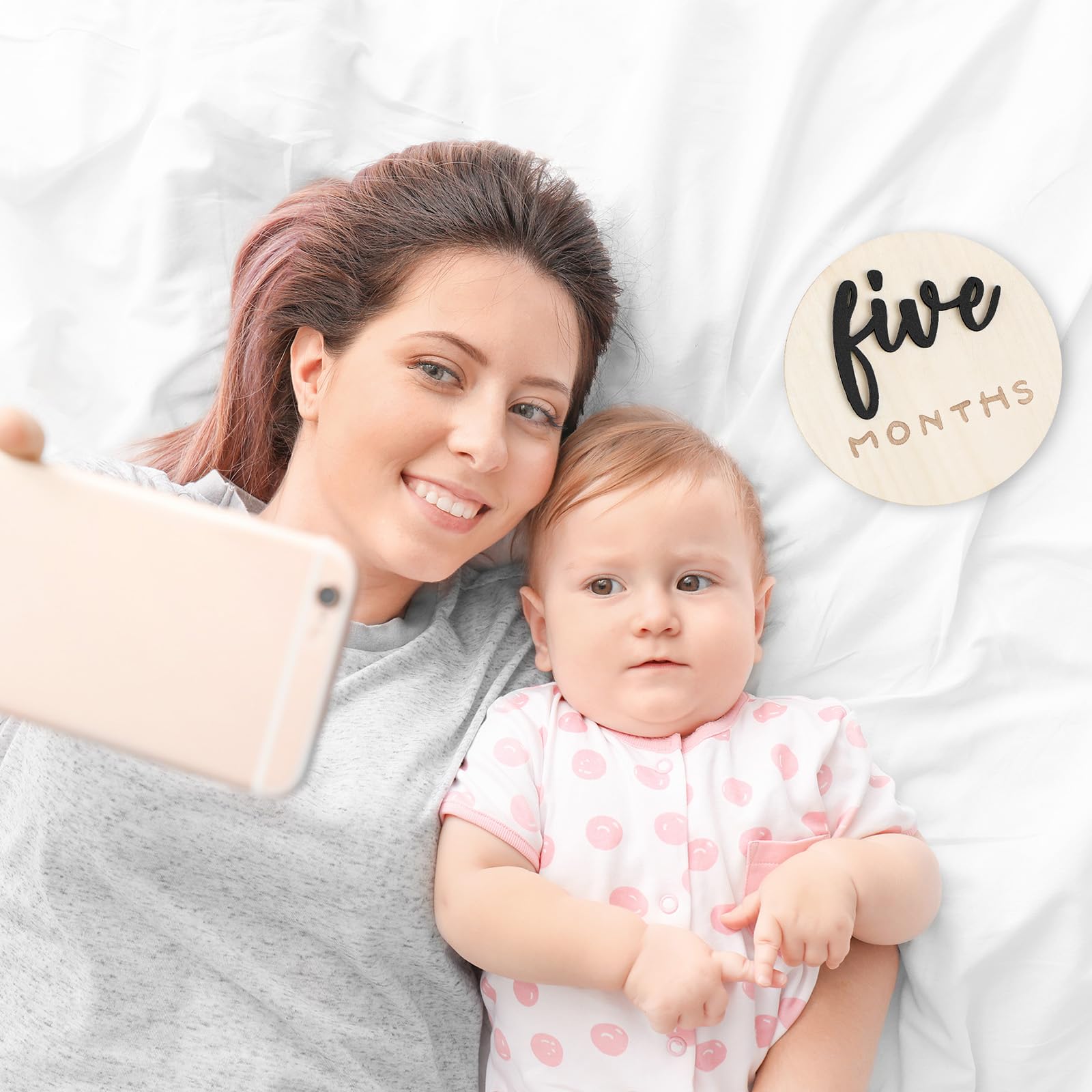 Burbell double-sided engraving highlights monthly milestones and hello world moments