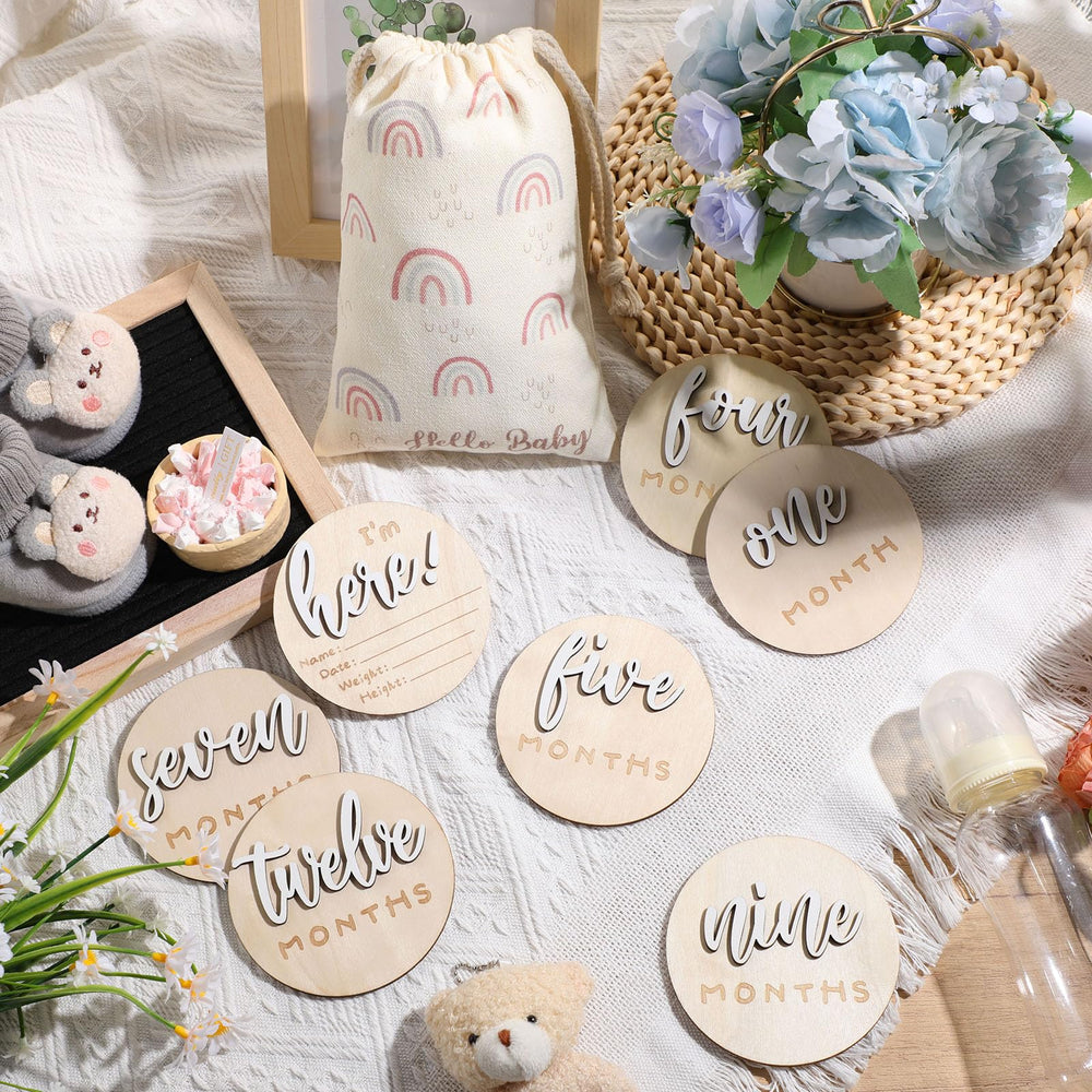 Burbell Hello World double-sided milestone disc ideal for newborn announcements.