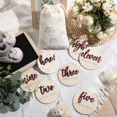 Burbell wooden circle milestone disc close-up showing natural grain texture for warm memories