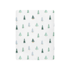 Burbuja Christmas Tree crib sheet closeup texture shows soft modal fabric