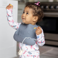 BUSY BABY Bungee Bib tethers adjustable features keep toys within reach.