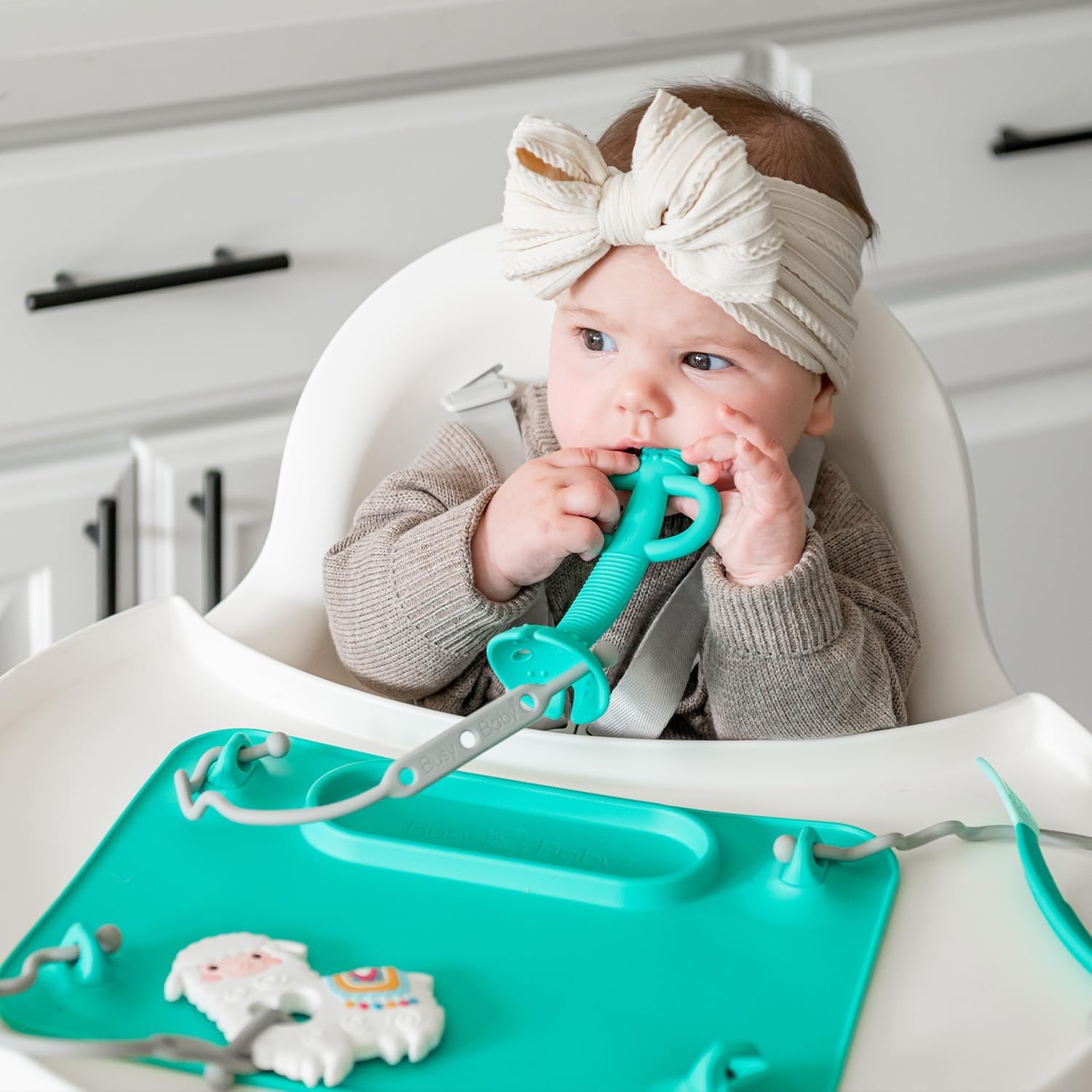 Busy Baby teething spoon self-feeding demo shows gradual eating independence.