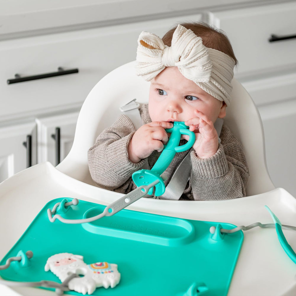 Busy Baby teething spoon self-feeding demo shows gradual eating independence.